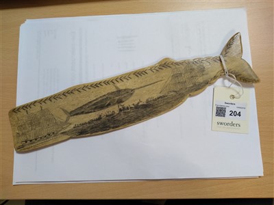 Lot 204 - A scrimshawed whalebone plaque