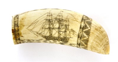 Lot 139 - A scrimshawed whale's tooth