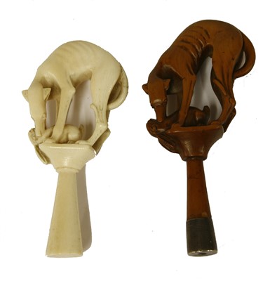 Lot 203 - A carved ivory pipe tamper
