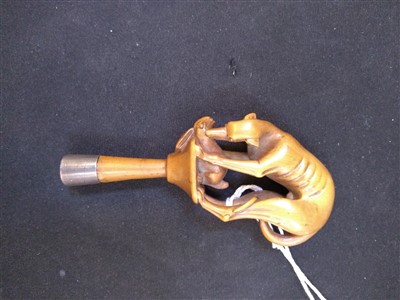 Lot 203 - A carved ivory pipe tamper