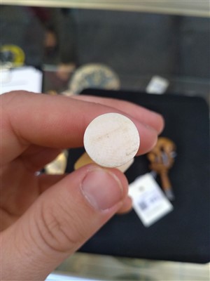 Lot 203 - A carved ivory pipe tamper