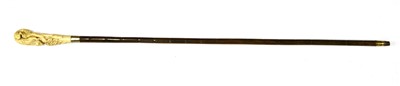 Lot 151 - A carved ivory and partridgewood(?) walking stick