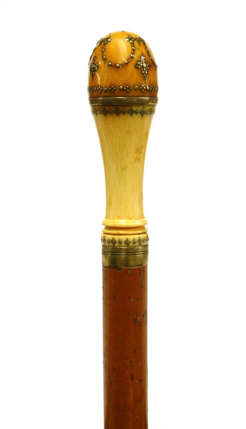 Lot 154 - An ivory and malacca gadget walking stick