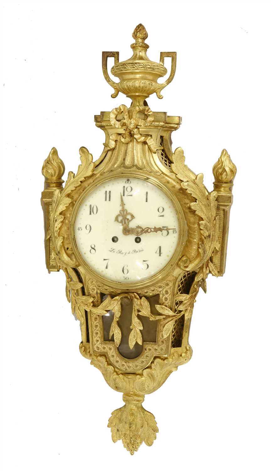 Lot 566 - A Louis XV-style gilt bronze cartel clock
