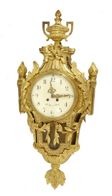 Lot 566 - A Louis XV-style gilt bronze cartel clock