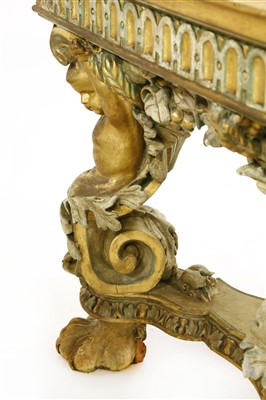 Lot 582 - A George II-style carved gilt and painted pier table