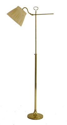 Lot 572 - An adjustable brass lounge light