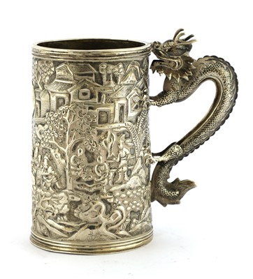 Lot 129 - A Chinese silver mug