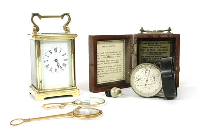 Lot 152 - A brass carriage clock