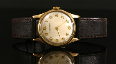 Lot 607 - A gentlemen's 9ct gold Ulysse Nardin automatic strap watch, c.1950