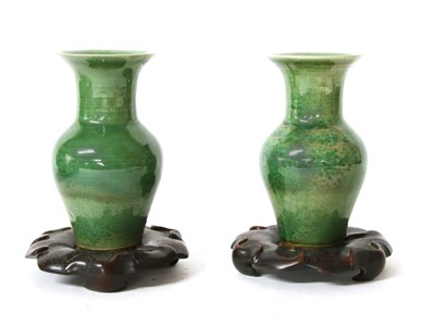 Lot 163 - A pair of Chinese green glazed vases