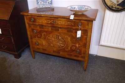 Lot 376 - An Italian walnut and inlaid commode chest