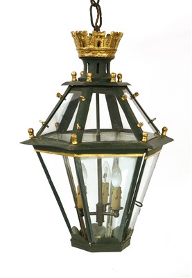Lot 810 - A toleware and glazed hanging lantern