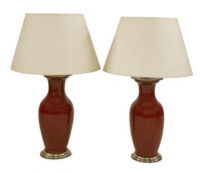 Lot 804 - A pair of Chinese sang-de-boeuf style table lamps