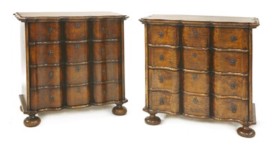 Lot 823 - A pair of reproduction oak serpentine front commode chests