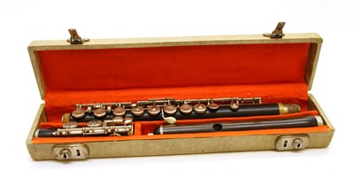 Lot 182 - An Isidor Lot rosewood and nickel mounted flute