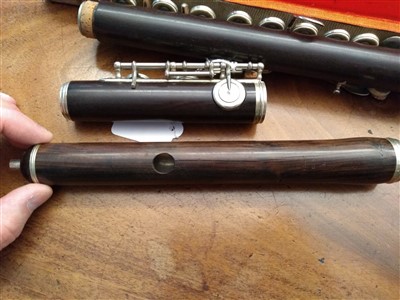 Lot 182 - An Isidor Lot rosewood and nickel mounted flute