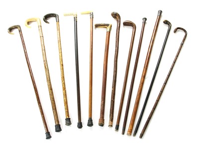 Lot 225 - Twelve antique walking sticks