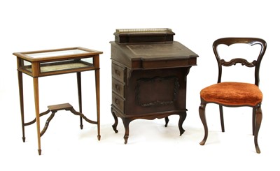 Lot 371 - An Edwardian mahogany Davenport with brass gallery