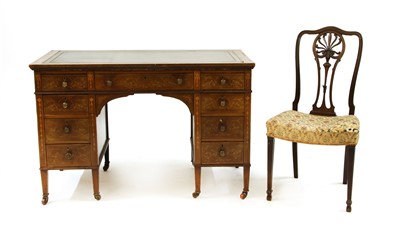 Lot 329 - An Edwardian marquetry writing desk in the Edwards and Roberts style