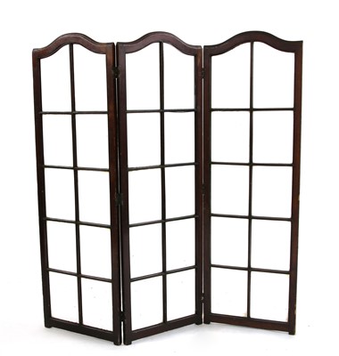 Lot 351 - A glazed mahogany three fold screen