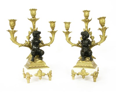 Lot 139 - A pair of three-branch candelabra