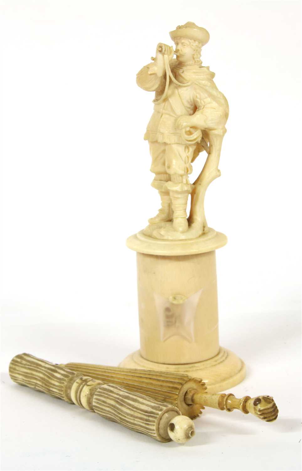 Lot 175 - A 19th century Dieppe ivory figure of a musician