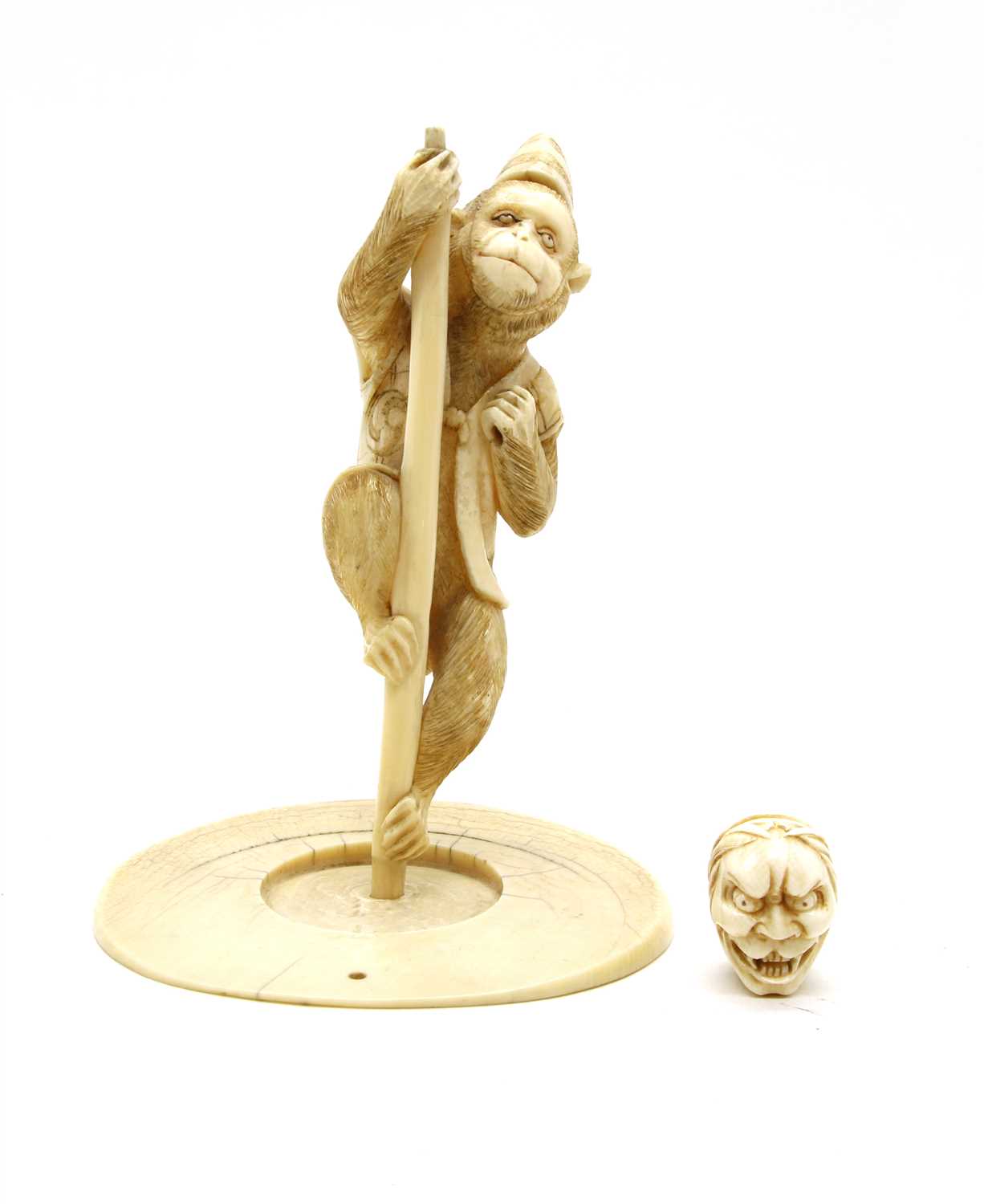 Lot 164 - A Meiji period Japanese carved ivory figure