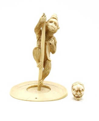 Lot 164 - A Meiji period Japanese carved ivory figure