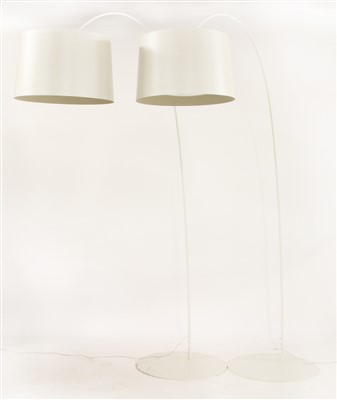 Lot 360 - A pair of white painted metal contemporary standard lamps
