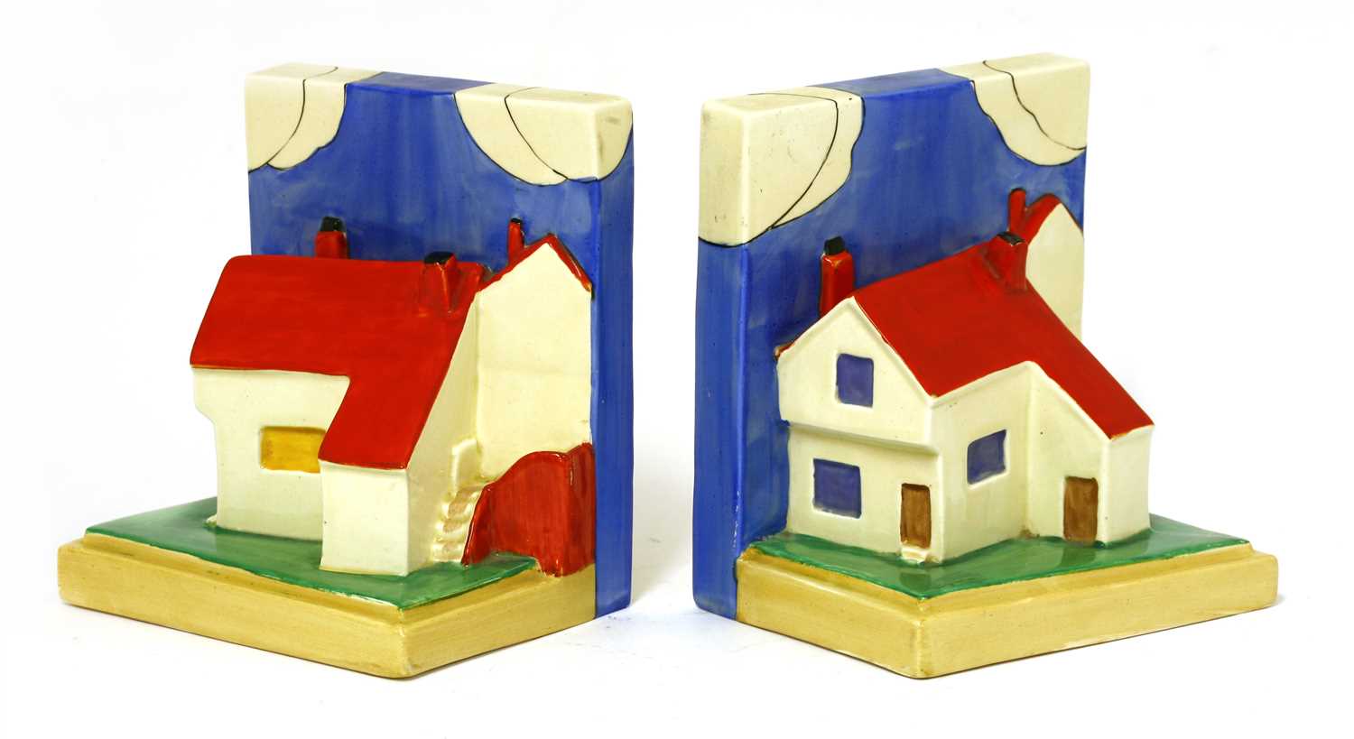 Lot 120 - A pair of Clarice Cliff cottage bookends