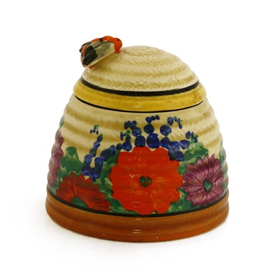 Lot 137 - A Clarice Cliff 'Gayday' Beehive honeypot and cover