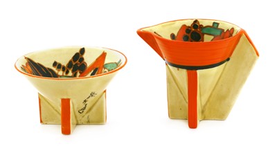 Lot 150 - A Clarice Cliff 'Red Trees and House' conical sugar bowl and cream jug