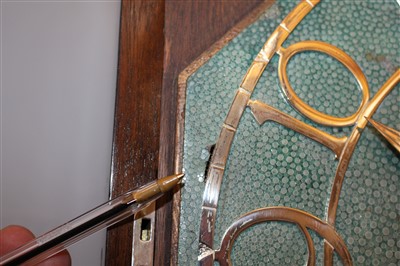 Lot 300 - An Art Deco Macassar veneered cocktail cabinet longcase clock