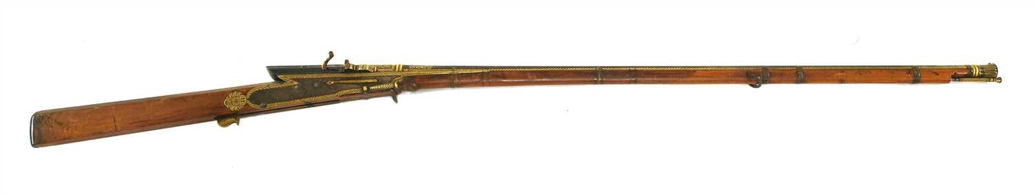 Lot 557 - An Indian 'torador' matchlock musket