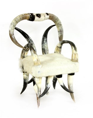 Lot 393 - A steer horn chair