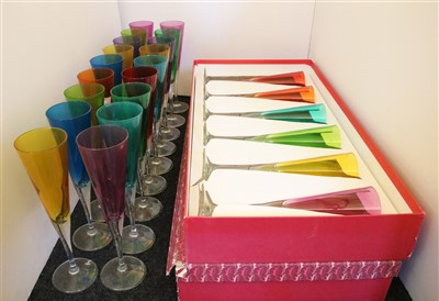 Lot 215 - A collection of multi coloured champagne flutes