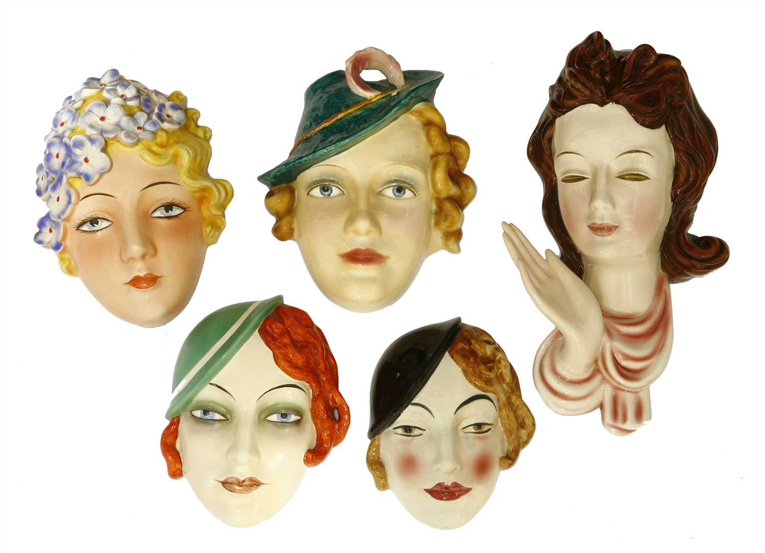 Lot 208 - Five Art Deco pottery wall masks