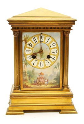 Lot 260 - A late 19th century French brass mantel clock