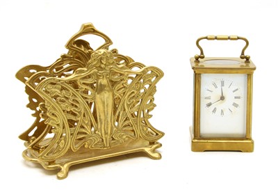 Lot 135 - A French brass carriage clock