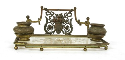 Lot 144 - A neo classical style bronze and glass ink stand