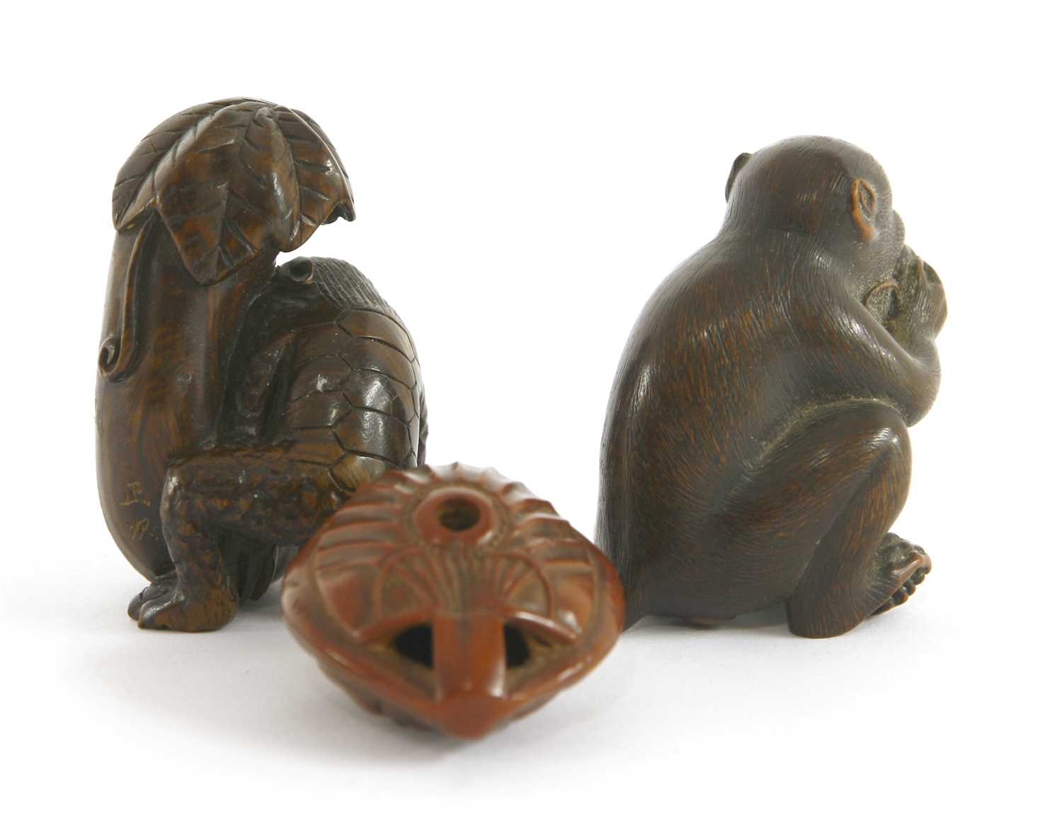 Netuke Lot 250 - Three Japanese netsuke,