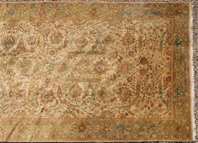 Lot 729 - A large Arts and Crafts style carpet