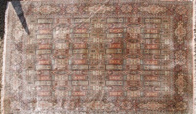 Lot 573 - A large Kashmir silk carpet