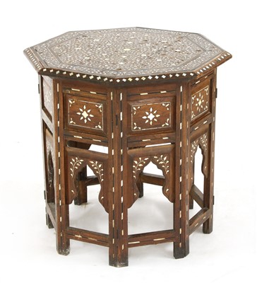 Lot 670 - An Ottoman octagonal low table