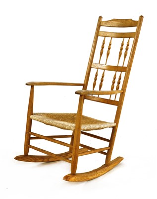 Lot 86 - An ash spindle back rocking chair
