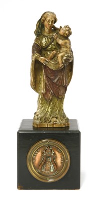 Lot 310 - An early carved wood figure of the Madonna and Child