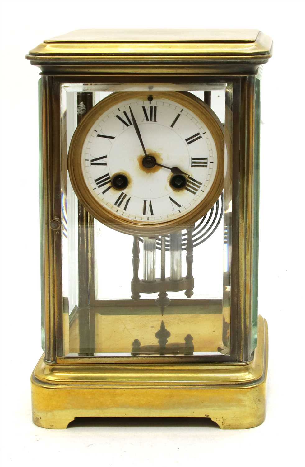 Lot 224 - A late 19th century brass and four glass mantel clock