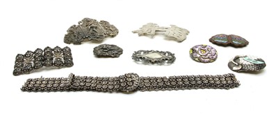 Lot 53 - A collection of oriental silver buckles