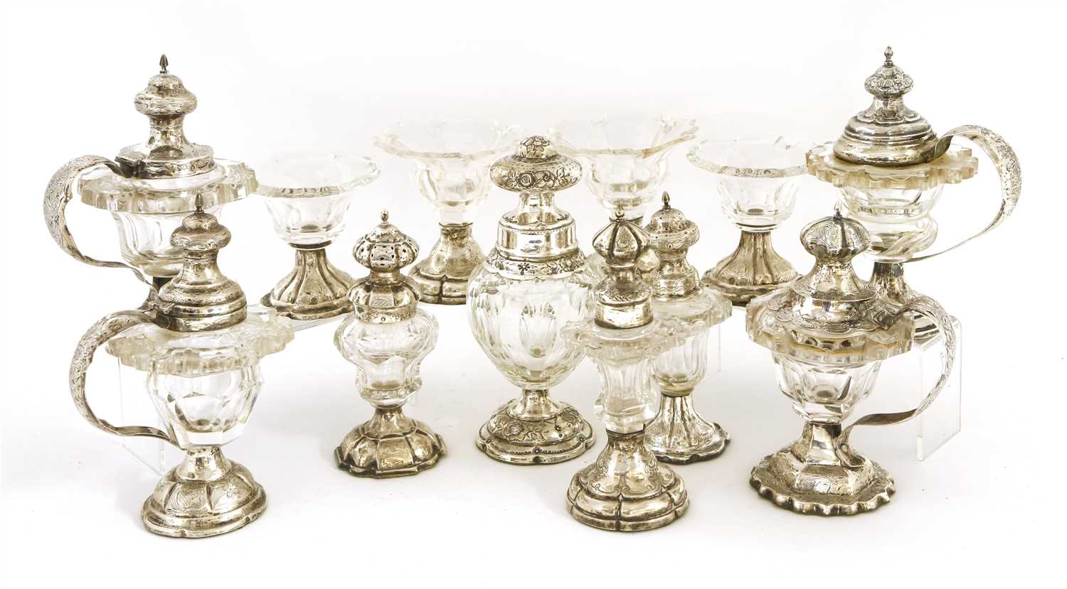 Lot 102 - A matched set of twelve Dutch white metal and cut-glass condiments